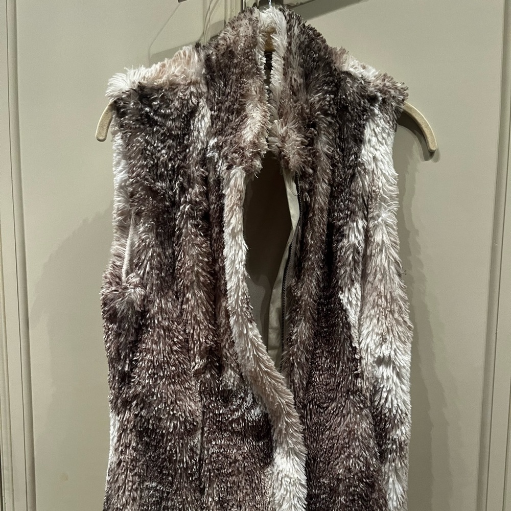 Beautiful Cabi fur vest.  Like new. Warm and fuzzy